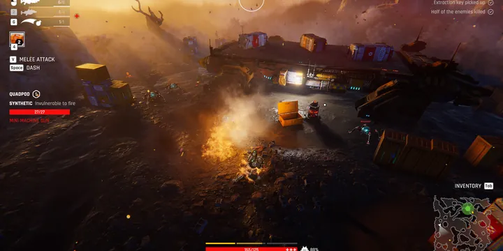Official Steam store screenshot: the squad pushing through smoky industrial ruins at night, orange laser fire and supply crates in view.